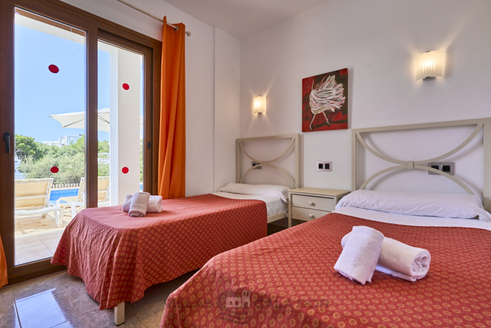 Bedroom at Cala Dia with outdoor access